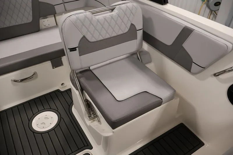 Slide: The Image of 2026 Bayliner VR6 Bowrider I/O interior with gray cushioned seating and sleek design. - 40