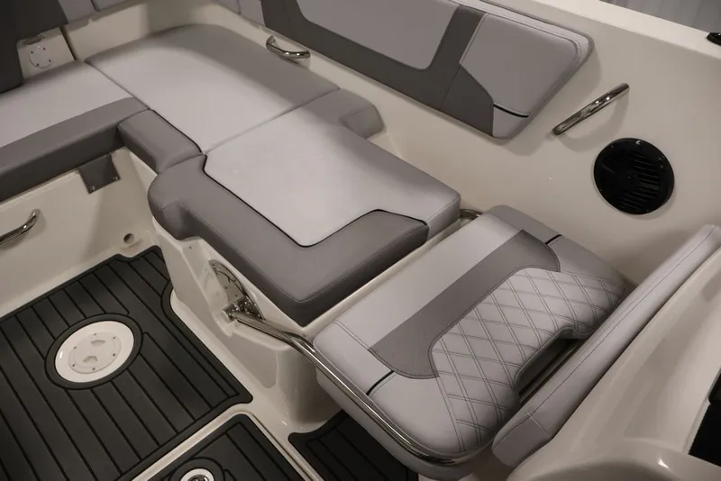 Slide: The Image of 2026 Bayliner VR6 Bowrider I/O interior seating with gray upholstery and modern design. - 25