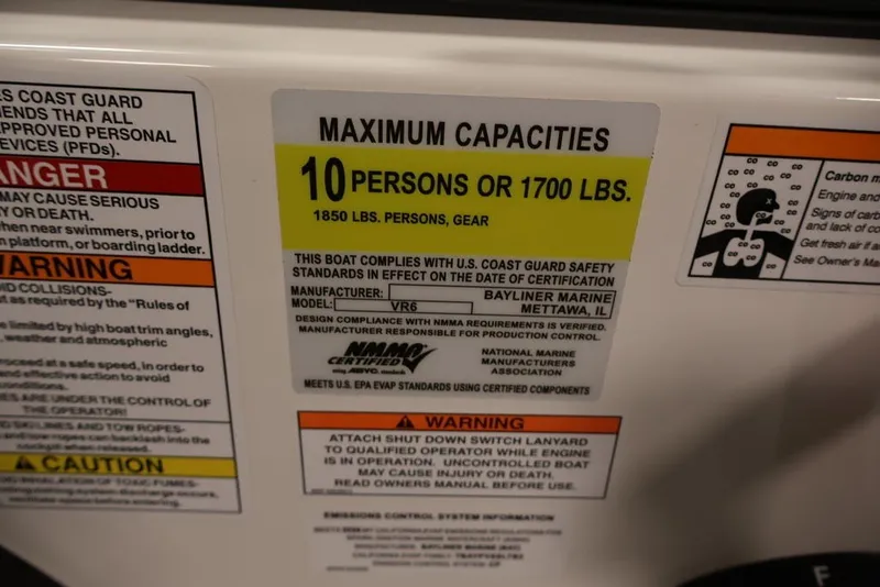 Slide: The Image of 2026 Bayliner VR6 Bowrider I/O capacity label, 10 persons or 1700 lbs limit. - 20