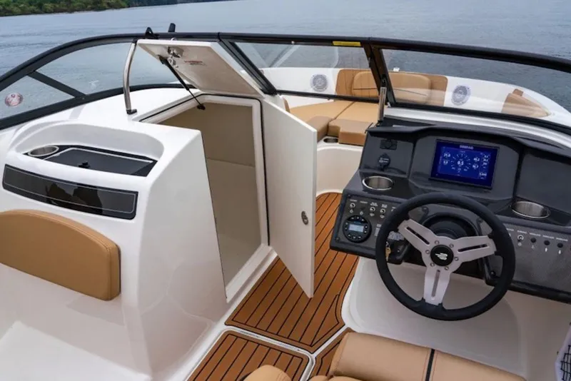 Slide: The Image of 2026 Bayliner VR6 Bowrider I/O interior with modern dashboard and seating. - 32