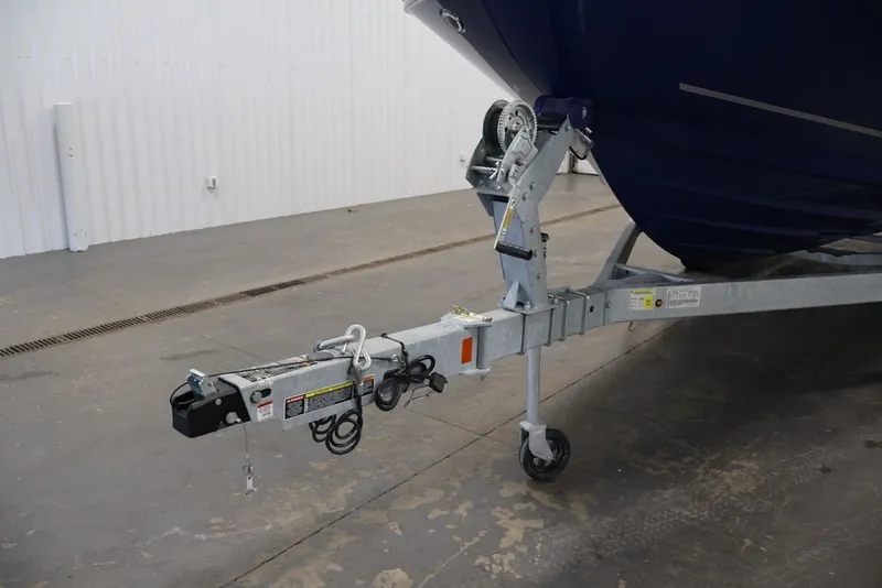 Slide: The Image of Trailer hitch of 2026 Bayliner VR6 Bowrider I/O in a garage setting. - 41