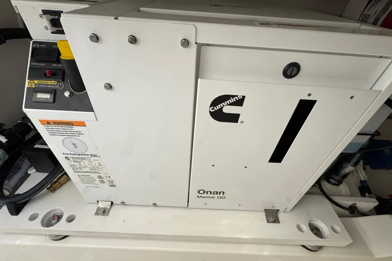 Slide: The Image of Cummins Onan Marine QD generator on 2025 Tiara Yachts 38 LS. - 22