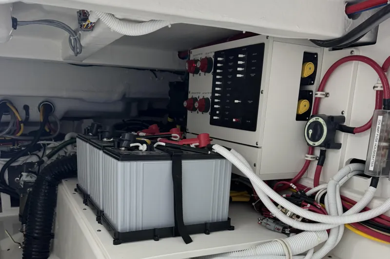 Slide: The Image of Electrical system of 2025 Tiara Yachts 38 LS, featuring battery and control panel. - 25