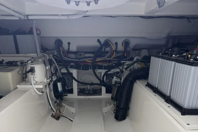 Slide: The Image of Engine room of 2025 Tiara Yachts 38 LS, showcasing wiring and components. - 26