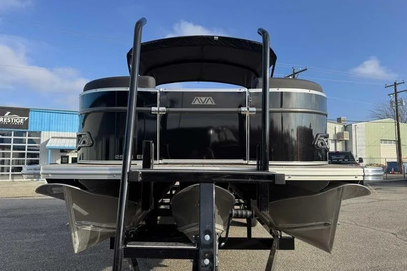 Slide: The Image of 2026 Avalon 2585 25 Catalina ENT pontoon boat on trailer, outdoor setting. - 4