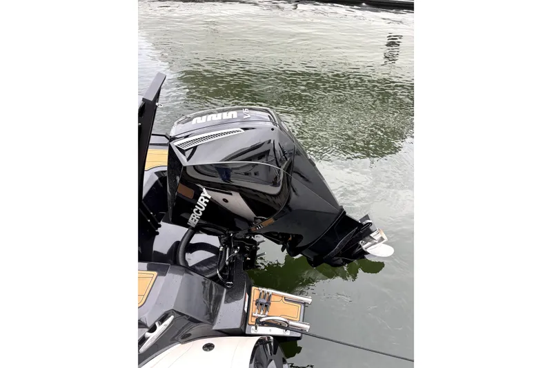 Slide: The Image of 2025 Brig NAVIGATOR22 with Mercury V6 outboard engine on water. - 18