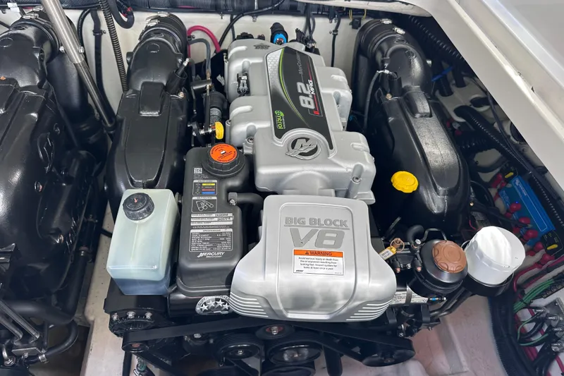 Slide: The Image of 2019 Formula 310 Bowrider engine compartment with Mercury Big Block V8 engine. - 12