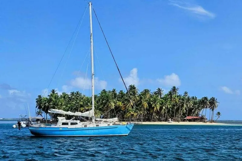 The Image of Sailboat Baraka 46 near tropical island, blue sky. - 1