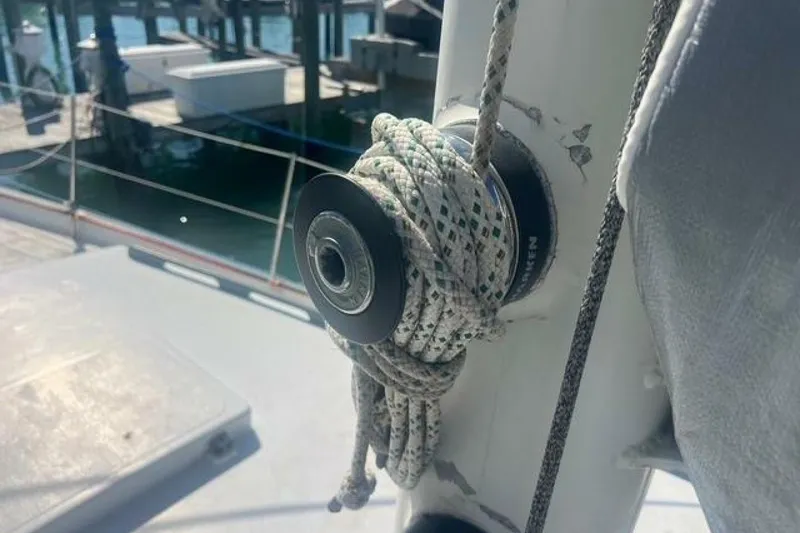 Slide: The Image of Winch with rope on 1993 Custom Baraka 46 sailboat deck. - 20
