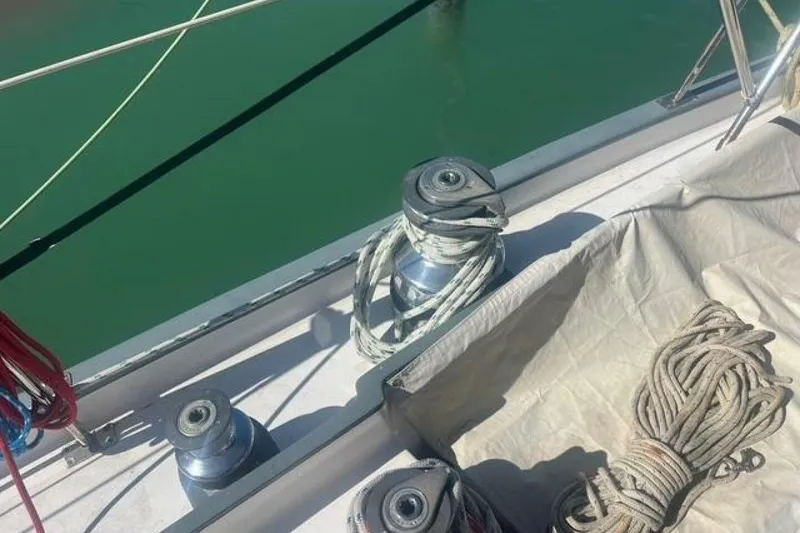 Slide: The Image of Deck of 1993 Custom Baraka 46 sailboat with ropes and winches. - 25