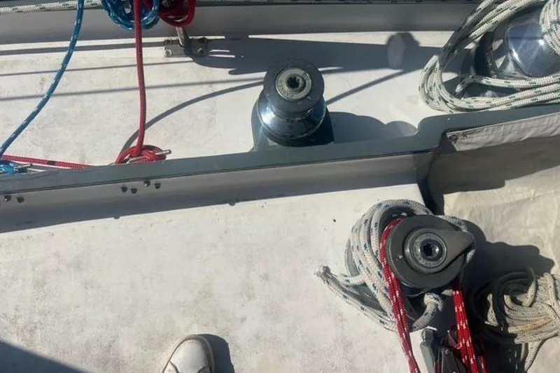 Slide: The Image of Deck of 1993 Custom Baraka 46 sailboat with winches and ropes. - 26