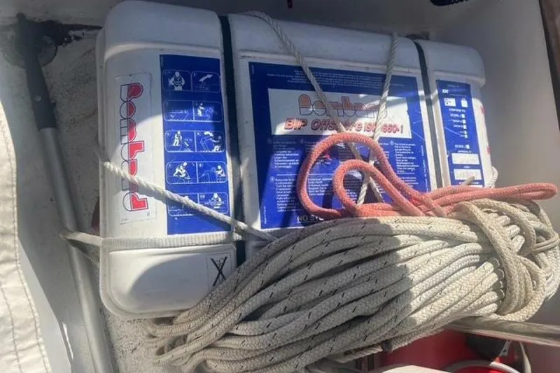 Slide: The Image of Safety equipment and ropes on a 1993 Custom Baraka 46 boat. - 27