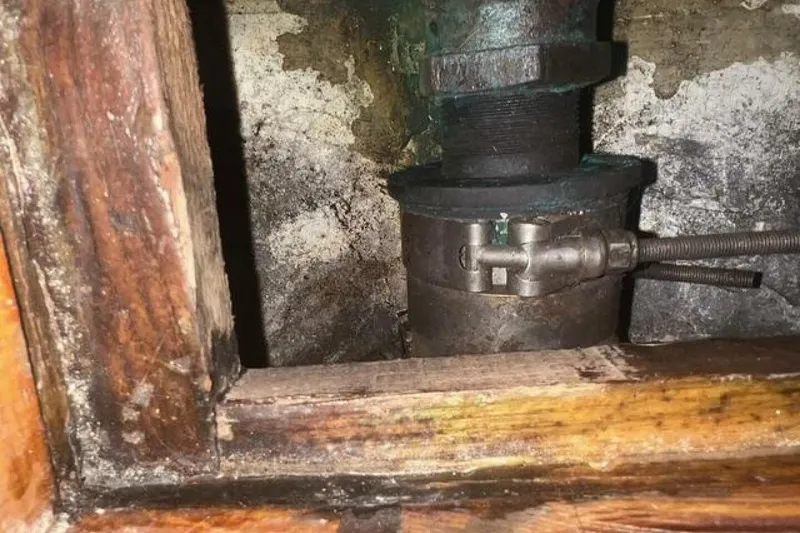 Slide: The Image of Rustic metal pipe fitting in wooden frame, Custom Baraka 46, 1993 model. - 31