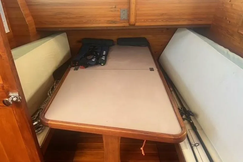 Slide: The Image of Cozy cabin interior of 1993 Custom Baraka 46 sailboat with wooden furnishings. - 5