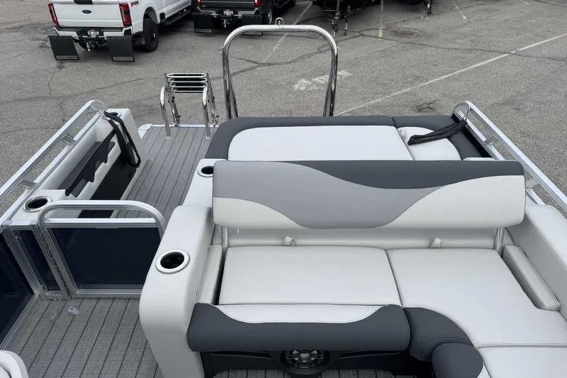 Slide: The Image of 2026 Avalon 2385 25 LSZ VRB pontoon boat interior with stylish seating and cup holders. - 13