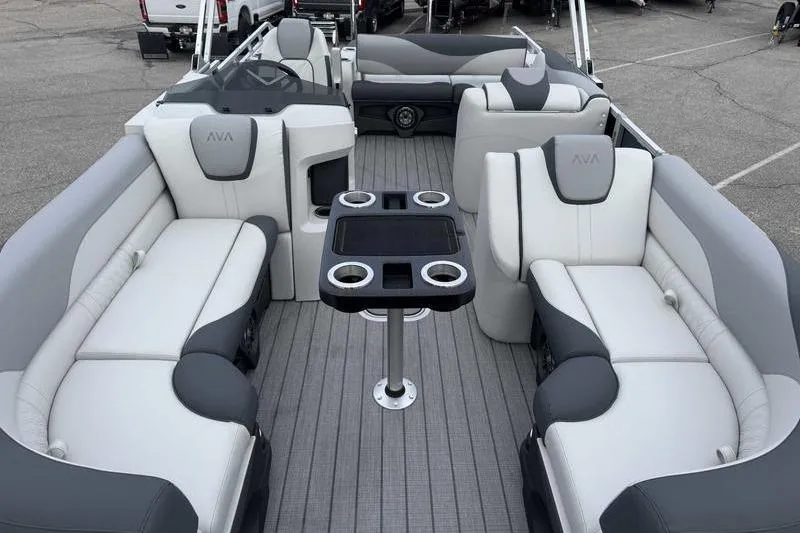 Slide: The Image of 2026 Avalon 2385 25 LSZ VRB pontoon boat interior with luxurious seating and table. - 8