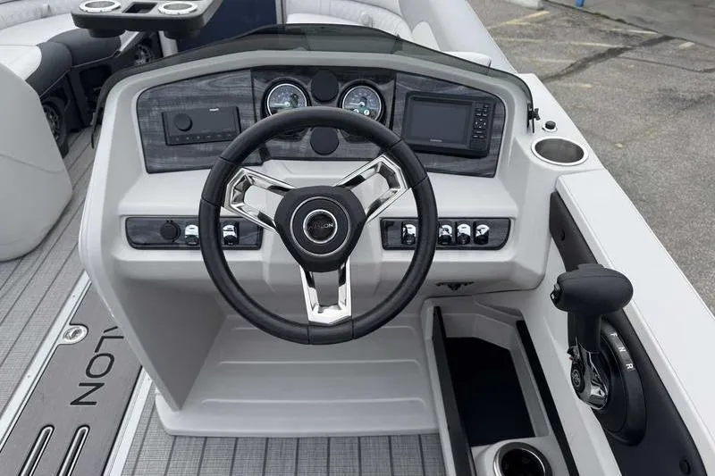 Slide: The Image of Steering console of 2026 Avalon 2385 25 LSZ VRB boat with modern controls and dashboard. - 9