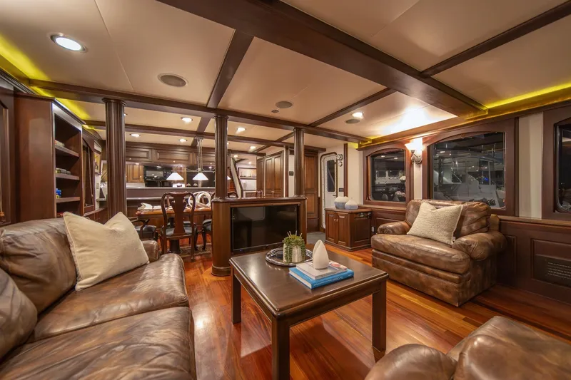 Slide: The Image of Luxurious interior of 2004 Northern Marine 80' Tri-Deck yacht with elegant wood finishes. - 17