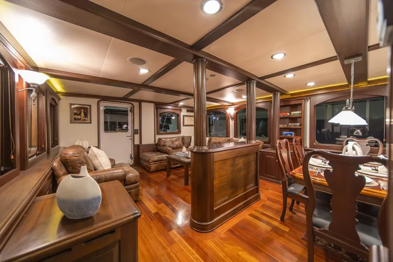 Slide: The Image of Luxurious interior of 2004 Northern Marine 80' Tri-Deck yacht with elegant wood finishes. - 18