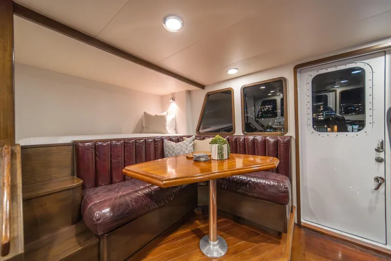 Slide: The Image of Luxurious interior of 2004 Northern Marine 80' Tri-Deck yacht with elegant dining area. - 30