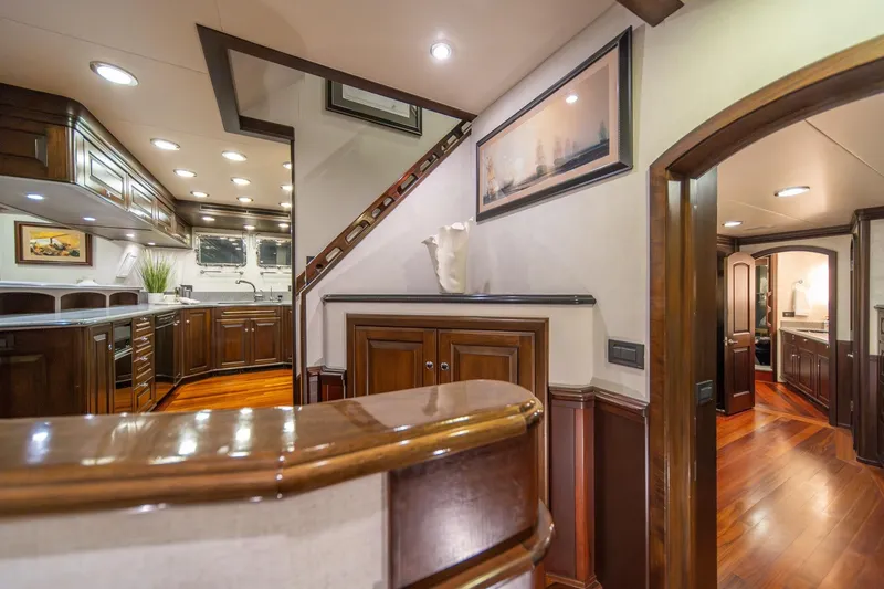 Slide: The Image of Luxurious interior of 2004 Northern Marine 80' Tri-Deck yacht with elegant wood finishes. - 33