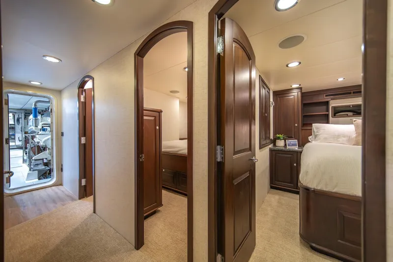 Slide: The Image of Luxurious interior of 2004 Northern Marine 80' Tri-Deck yacht, featuring elegant wood finishes. - 42