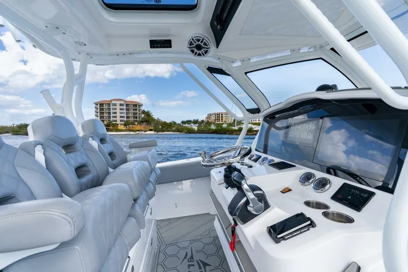 Slide: The Image of 2023 Blackwater High-Performance boat interior with luxury seating and advanced navigation system. - 19