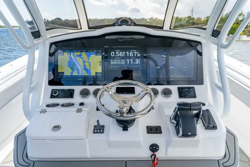 Slide: The Image of 2023 Blackwater High-Performance boat dashboard with advanced navigation and control systems. - 22