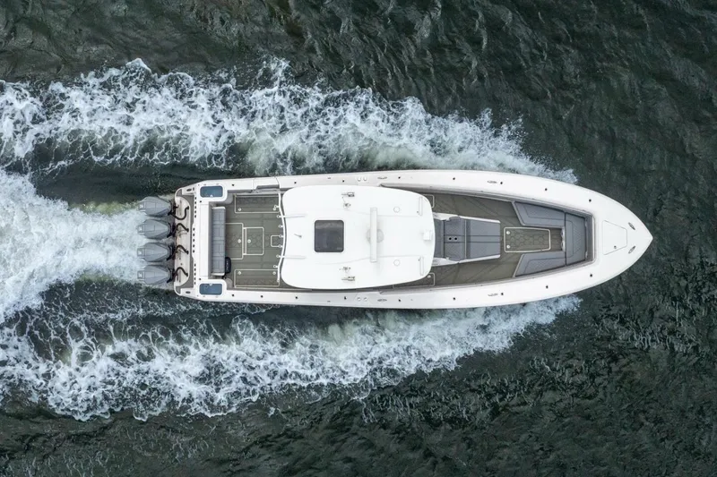 Slide: The Image of Aerial view of 2023 Blackwater High-Performance boat cruising on water. - 9