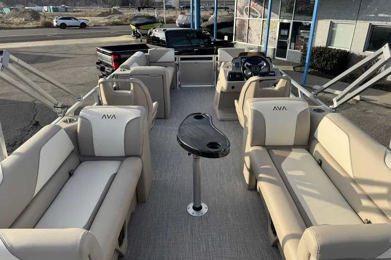 Slide: The Image of 2026 Avalon 2180 23 Venture QL pontoon boat with spacious seating and modern design. - 6