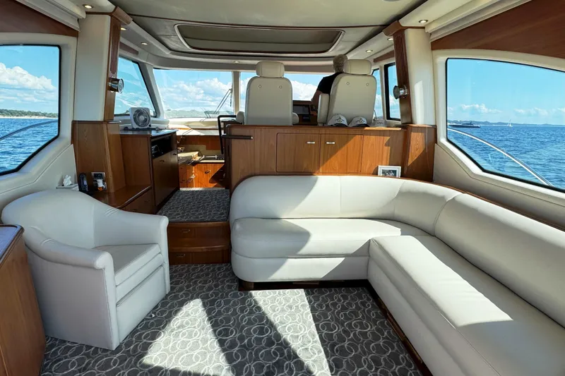 Slide: The Image of Luxurious interior of 2014 Tiara Yachts 5800 Sovran with elegant seating and ocean view. - 19