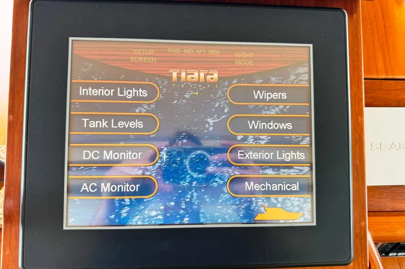 Slide: The Image of Touchscreen control panel on a 2014 Tiara Yachts 5800 Sovran, displaying various system options. - 31