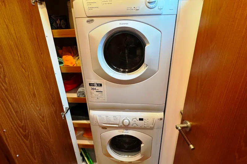 Slide: The Image of Stacked washer and dryer in Tiara Yachts 5800 Sovran, 2014 model. - 51