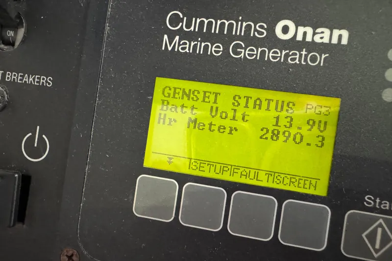 Slide: The Image of Cummins Onan marine generator display on 2014 Tiara Yachts 5800 Sovran. - 62