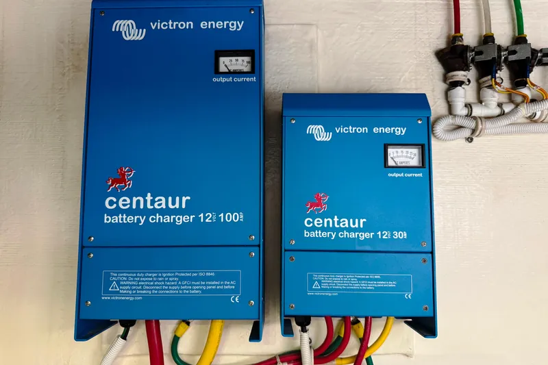 Slide: The Image of Victron Energy Centaur battery chargers on a 2014 Tiara Yachts 5800 Sovran. - 65
