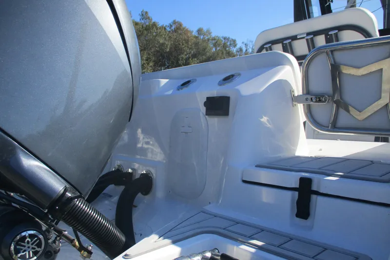 Slide: The Image of 2026 Sea Fox 268 Commander boat interior with engine and seating details. - 11