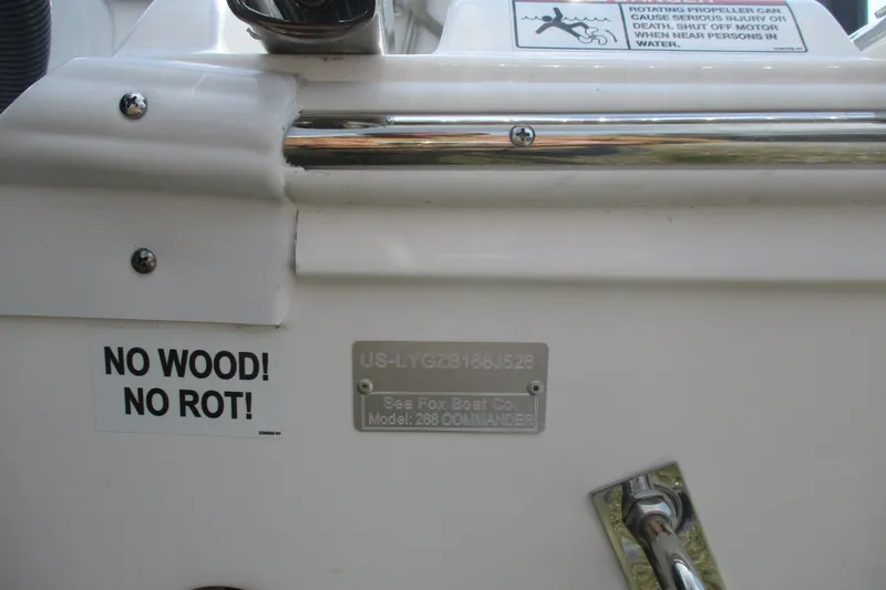 Slide: The Image of 2026 Sea Fox 268 Commander boat with "No Wood! No Rot!" label and safety warning. - 14