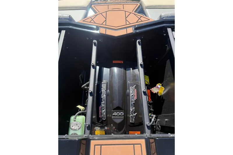 Slide: The Image of 2022 Tigé Z1 boat engine compartment with Raptor 400 engine. - 7
