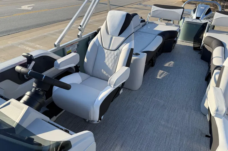 Slide: The Image of 2026 Avalon LSZ Quad Lounger Shift boat interior with luxurious seating and modern design. - 12