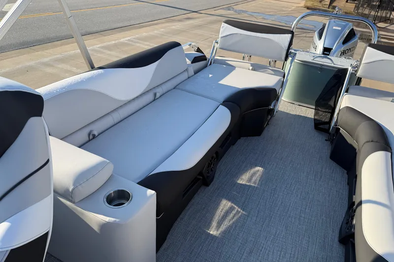Slide: The Image of 2026 Avalon LSZ Quad Lounger Shift boat interior with sleek seating and modern design. - 13