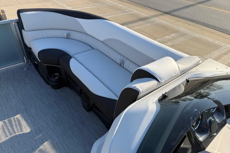 Slide: The Image of 2026 Avalon LSZ Quad Lounger Shift boat interior with sleek seating and modern design. - 22