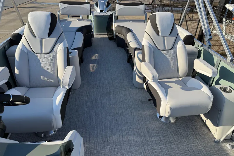 Slide: The Image of 2026 Avalon LSZ QUAD LOUNGER SHIFT boat interior with luxurious seating and modern design. - 25