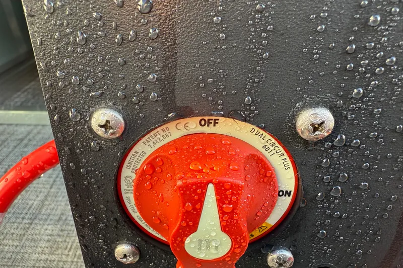 Slide: The Image of Red ignition switch on Avalon LSZ Quad Lounger Shift 2026, with water droplets. - 27