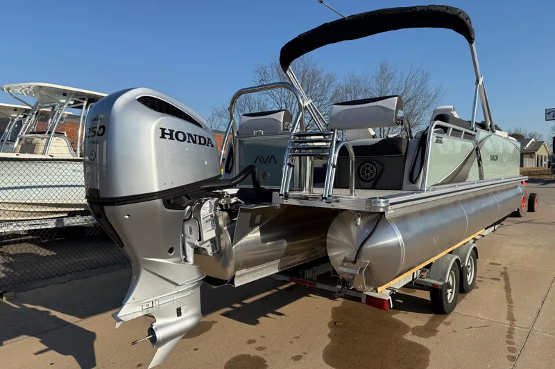 Slide: The Image of 2026 Avalon LSZ Quad Lounger Shift pontoon boat with Honda 150 VTEC engine. - 4