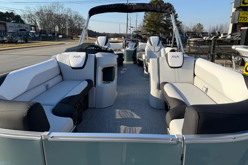 Slide: The Image of 2026 Avalon LSZ Quad Lounger Shift pontoon boat with luxurious seating and modern design. - 6
