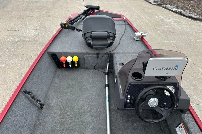 Slide: The Image of 2024 Tracker Bass Tracker Classic XL boat interior with Garmin navigation system. - 4