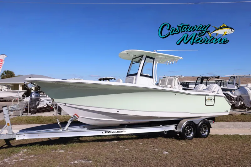 The Image of 2026 Sea Hunt Ultra 275 SE boat on trailer at Castaway Marine dealership. - 0