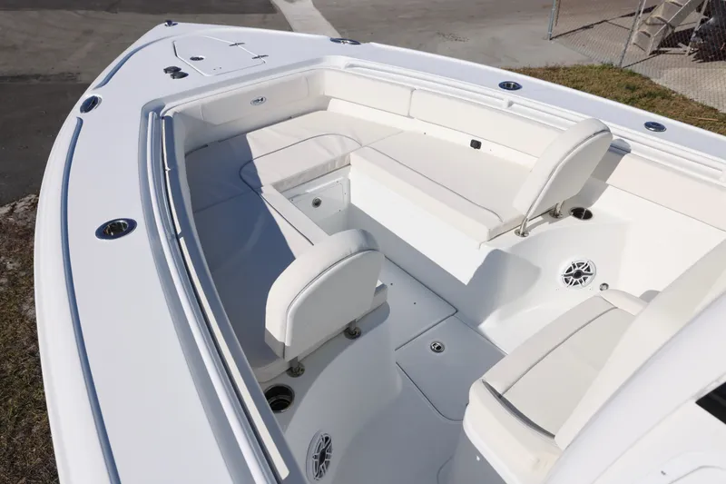 Slide: The Image of 2026 Sea Hunt Ultra 275 SE boat interior with white seating and modern design. - 10