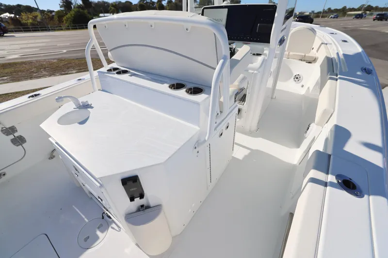 Slide: The Image of 2026 Sea Hunt Ultra 275 SE boat interior with seating and console features. - 25