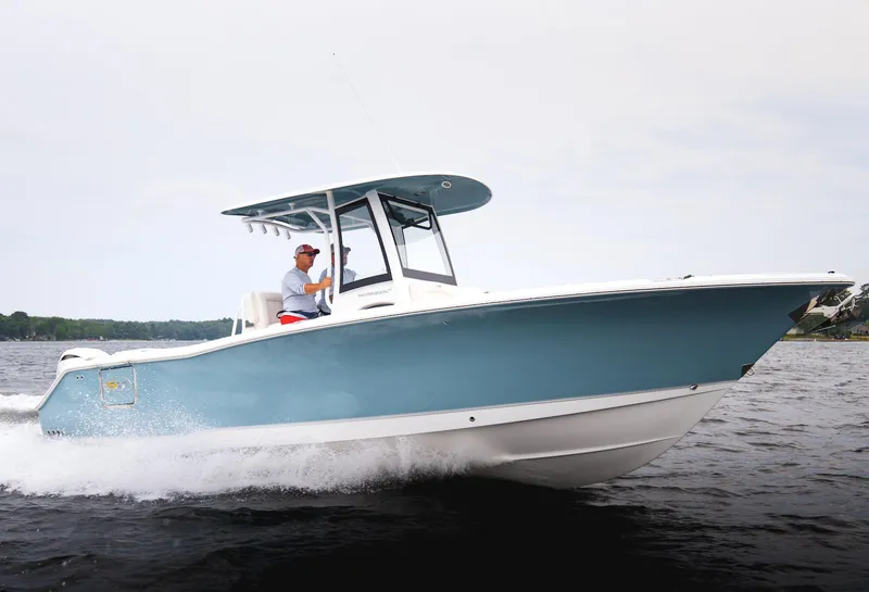 Slide: The Image of 2026 Sea Hunt Ultra 275 SE boat cruising on open water. - 49